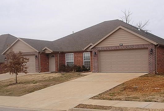 Nice Duplex in Copper Oaks S/D. Unit has several amenities including Granite Countertops, Ceramic Tiles in wet areas, Gas Log Fireplace, Crown Molding, Jacuzzi Tub in Master Bath, all appliances including washer & dryer, 6 Ft Privacy Fenced Yard & more! Just minutes from Downtown Bentonville & Walmart Home Office. Pictures & colors may vary per unit.
