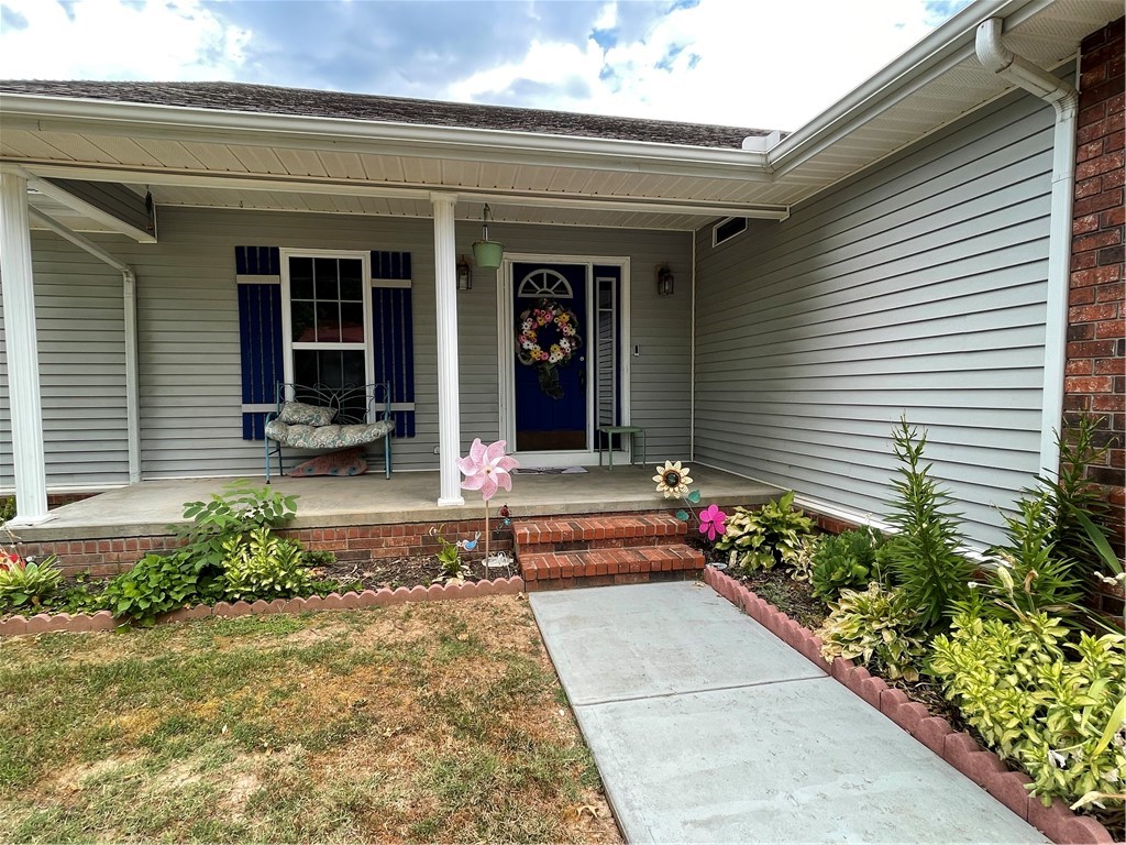 Are you looking for a home and home business location? Look no further. This home boasts 3 bigger bedrooms, 2 bathrooms, a large living room, big family room with sliders to the deck and a kitchen/dining room that holds 8 or more. The kitchen has an island to prepare dinner on and an awesome attached pantry area in arms reach. The home has a hidden room that could be used for additional storage or a small office area. Don't forget about the home business location too! What looks like a large shop is actually a very nice office building. 2400 sq of insulated, heated & cooled office space with customer greeting area, 3 offices, full bathroom with w/d connections and workspace. Upstairs can be used for additional storage or a man/woman cave. Too many amenities to list, call today for your private tour. **Surveillance System stays with the property.