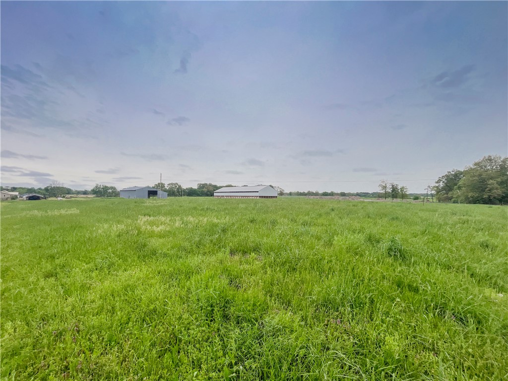 Beautiful 16.5 +/- acres available in the Harmon area to build your country estate. Quiet country living but still near town! 6000 sf stacking shed as well as an additional barn. Water is at the street. Electric is on site. Perc tests have passed. Land has been split into 3 individual lots and may be bought in part or in whole. For map directions, you can also try CR 874 instead of White Oak Rd. See MLS 1303975, MLS 1304076, and MLS 1304078