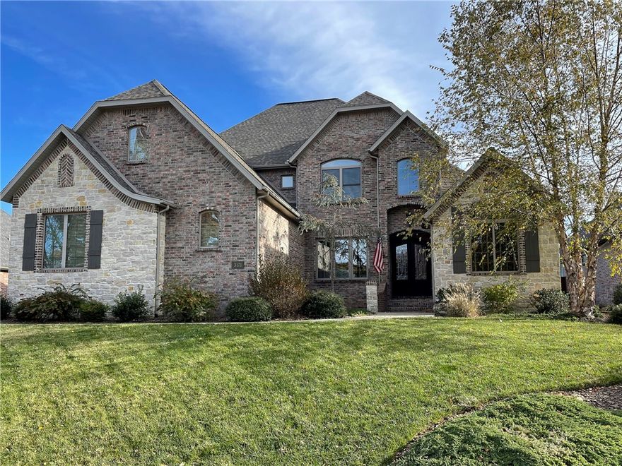 Love Where You Live! Here's your opportunity to own a custom designed home with upgrades throughout. Relax and entertain in the expansive outdoor living space with inground heated pool and multiple entertaining spaces! Gourmet kitchen with expansive island perfect for prepping or entertaining. Gorgeous architectural features of coffered, beamed vaulted ceiling, transom windows, real hardwood floors and open floor plan create a space your won't want to leave. Formal Dining Room, office, bonus room and media room. Storm Shelter in garage. 4BR with office or office can become 5th BR,. Inground pool is heated and salt water pool.