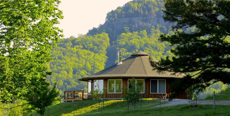 Ozark Mountain Resort/Retreat with Home&Farm on 88 pristine acres. Experience the best of Newton County Arkansas with this established and income producing Cabin Rental Business, Home & Farm all nestled in a park like setting! This stunning property is located in a quiet and beautiful area near the headwaters of the Buffalo National River and offers some of the most spectacular views in Newton county, a quarter of a mile creek frontage with private 'swimming hole', various springs, pastures, hiking/riding/atv trails and more! It includes one 3BR/1.5BA 2-story home, four 1 BR/1BA homes/cabins and a 30x50 pole barn/shop. The farm is complete with fencing and cross fencing, various corals, hay sheds, goat shed, chicken coops, 3 ponds etc., and can accommodate any type of livestock. A perfect organic garden spot along with a geodesic greenhouse provides for year a round organic gardening opportunity. Truly too many features and to list so please schedule an appointment and come see for yourself!