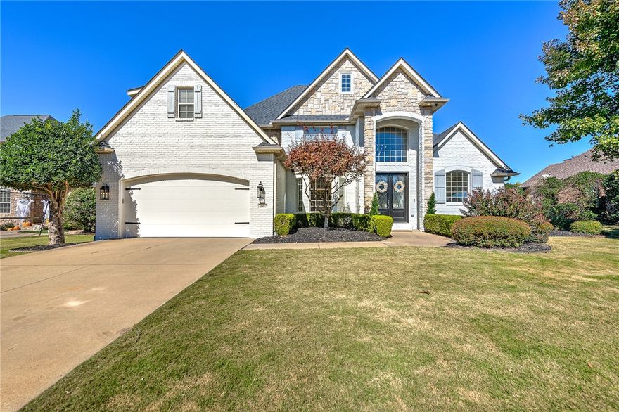 Welcome to your dream home in the prestigious Shadow Valley subdivision of Rogers! This 5-bed, 3.5-bath gem offers 3,467 sqft of luxury. Enjoy stunning views of the 1st hole on Shadow Valley Golf Course. Upgrades include fresh paint, white cabinetry, and updated fixtures. Spacious living areas flow seamlessly, featuring a gas fireplace & wet bar. The main suite, located on the ground floor, provides a tranquil retreat with both a tub and walk-in shower. Gourmet kitchen with double ovens, pantry, & fridge. Built-ins in the office provide functional workspace, while the storage room offers ample room for your belongings. Go outside to the covered deck, perfect for enjoying sunsets & overlooking the 1st Hole, or gather around the firepit area for cozy evenings. This home is an entertainer’s paradise, with the golf cart trail conveniently located beside the property. Community amenities include a clubhouse, exercise room, gated security, pool, & tennis court. New roof 2020. Your elegant golf course-facing haven awaits!