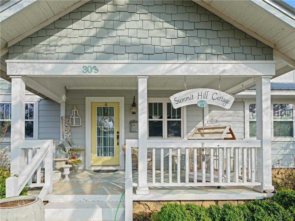 Welcome to this charming 3 bedroom, 2 bathroom historic home in Prairie Grove, AR. This completely remodeled home features high-end finishings and comes equipped with all stainless steel appliances. The beautiful stone fireplace adds a touch of elegance to the living space, while the sunroom provides a cozy spot to relax and enjoy the county charm living. Don't miss out on the opportunity to make this historic Prairie Grove home your own.