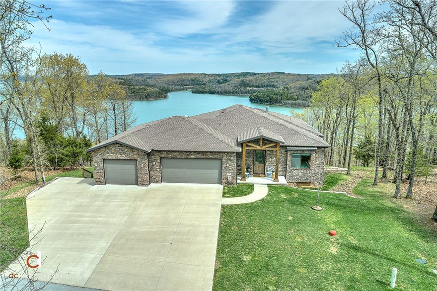 Enjoy spectacular lake views from this 5788 SF custom built (2017) lake home. Easy access to a boat slip with lift. Located just 20 minutes East of Rogers, AR on Beaver Lake, this lovely ranch style home with a lower level walkout basement overlooks Rambo Cove and is only minutes to War Eagle Cavern, Hobbs State Park and Karst Bike Trails. 4 BD/4 BA, office, media room, game room with 8' pool table and 2 piece ping pong table to convey. Laundry room on each level. All appliances and electronics convey. See attached seller's information -- too many amenities to list!!