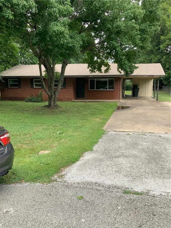 Investment opportunity! Nice neighborhood close to the U of A and easy access to I-49. 3 Bedrooms, 2 Bathrooms and nice living area on a .40 acre lot. There is also a bonus room that can be used as a bedroom, but it doesn't have a closet. This home has luxury vinyl plank and ceramic tile, no carpet, and all appliances convey. Rents for $2300 a month, fully furnished, and utilities are included up to $350. Photos are from 2019. *No showings without an accepted offer. No sign, no lockbox. Please do not disturb the tenants. New 12 month lease starting August 1st must be honored by buyer.*