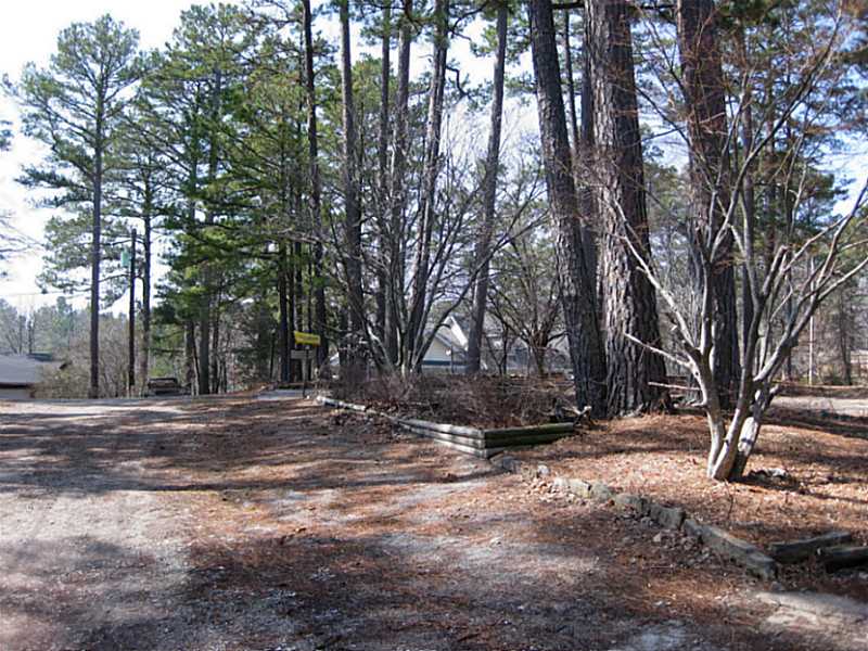 Beautiful lot to build your dream home. Lot has been cleared and has all utilities on site; Public water, electric,septic,detached 24x32 one car workshop comes w/ property. Previous home on lot burned down.