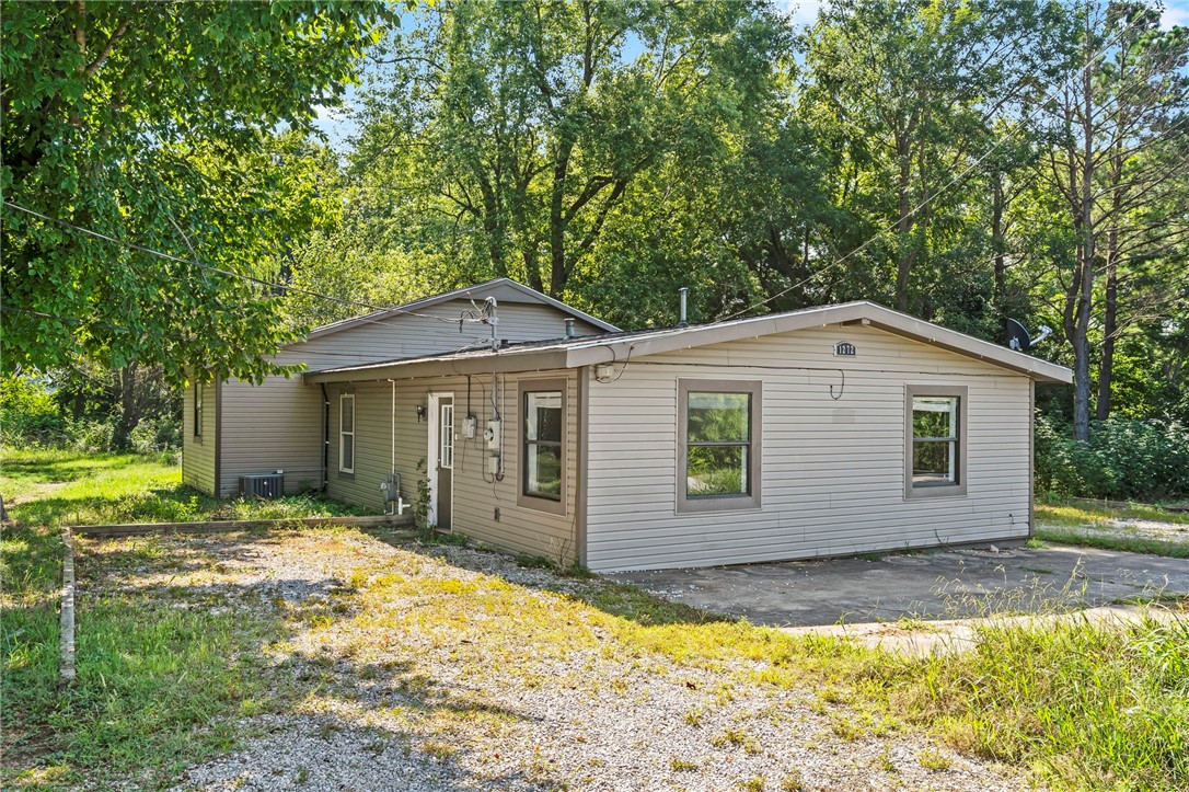 Quaint home in a prime location with incredible development potential. While the layout could use some reimagining and the home a little TLC, opportunities like this at this price point are few and far between. The home was fully renovated in 2019 with major updates including a new roof, HVAC, luxury vinyl plank flooring, granite countertops, and more. Sitting on a spacious .82-acre lot, zoned for residential multi-family use, and access to the back of the lot from Luna st, this property offers potentially multiple build sites which means this has exciting development opportunities. Currently the home is on well and septic but there is a 8" water line and a 8" sewer line on the back side of the lot at the street. If you're looking for your next investment with room to grow, this one is worth a closer look.