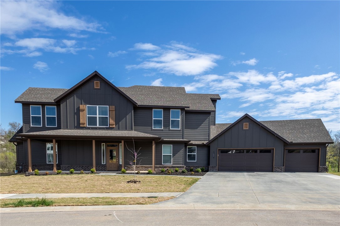 This beautiful home boasts a tranquil creek and a golf-front view. As you enter the home, you are welcomed by a spacious foyer that leads you to an expansive open-concept kitchen, dining, living room, and the owner's suite, laundry room, mudroom, and powder bath, all found on the first level. Upstairs, you will find three bedrooms, a bonus room, a storage closet, and two full bathrooms. With a 3-car garage, you have ample vehicle and golf cart space! The location is perfect, with easy access to everything Northwest Arkansas offers, including the Bentonville bike trails and Rogers Pinnacle Hills Promenade, approximately 20 minutes away. One-year complimentary golf course membership included! Probuilt.