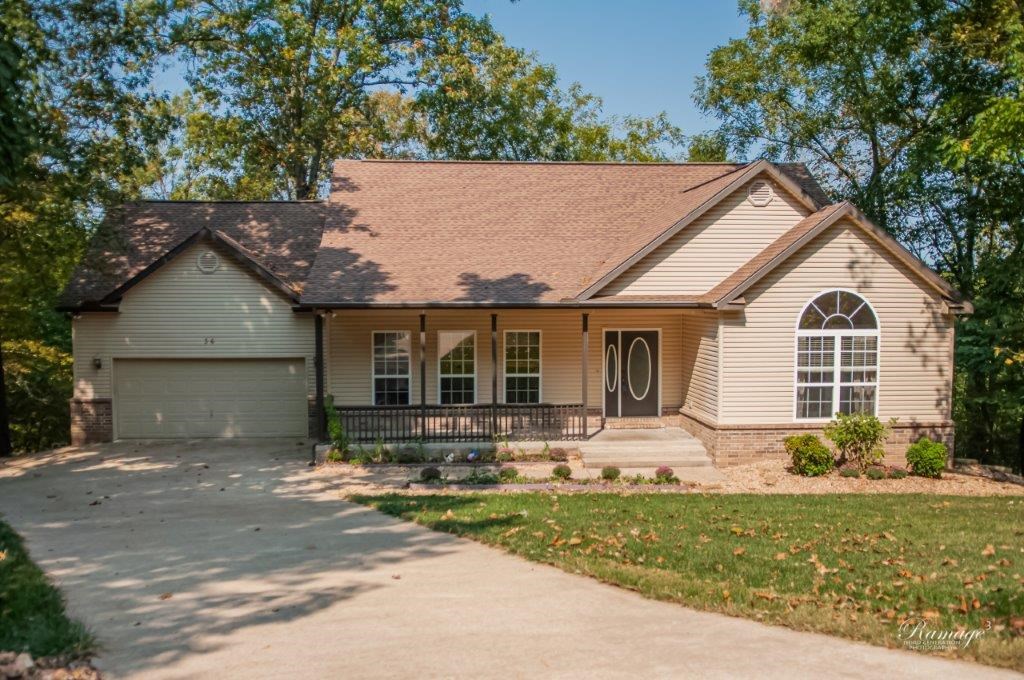 Your sanctuary awaits! This quiet cul-de-sac home has year round lake views of Loch Lomond from the 4 season sunroom and deck area. From the back yard take a short walk down to Tiree Park and the lake. Lower level can be used as 4th bedroom, second living area, or office with a full bath and walk out heated shop or gym area. Quick access to the new highway and you can have it all!
