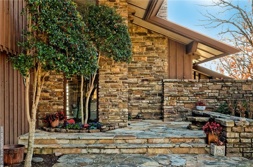 Unbelievable estate property on 3.3 gorgeous and private acres designed by E. Fay Jones. Designed for Frank & Barbara Broyles! Beauty and quality with hand made architectural details. Stone walls, 2 massive stone fireplaces, stone waterfall entry, interior has some wood floors, panoramic views, full apartment upstairs, separate guest quarters on main level. So many amenities. 6 bedrooms, 5 baths, 3 living areas. Extensive decks offer privacy and unlimited views. 3 car carport. One of a kind masterpiece.  Call Agent for further details and information. See attached Brochure.