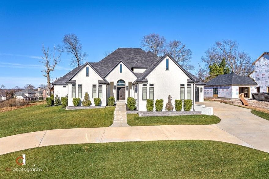 WOW!  SOPHISTICATED ELEGANCE IN THE HEART OF NWA!  Located inside the gates of the prestigious Pinnacle Country Club, this showstopper was completely rebuilt in 2019 with top of the line amenities throughout!  Beautiful open floor plan with spectacular chef’s kitchen offering large island w/ quarts counter tops and stainless appliances including double ovens, gas range, pot filler, ice machine, beverage fridge and large pantry.  Spacious living room w/ fireplace that walks out to a fabulous covered patio complete with private motorized screens to create a private getaway plus outdoor kitchen, fireplace, TV and hot tub.  Main level master retreat w/ fireplace and spa-like en suite bath w/ marble flooring, soaking tub, large walk-though shower and his and her walk-in closets.  Large media/bonus room, private office w/ built-ins, and main level guest suite. Second level hosts 2 guest suites and storage space!  Located within walking distance to pool and tennis courts, this 4 bedroom/4.5 bath home is simply STUNNING!