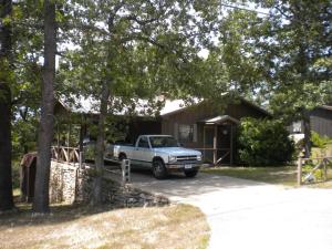 This 3bed 2bath charmer has a yearround lakeview of the glistening waters of Bull Shoals Lake! You will love the wood burning fireplace,open floorplan,wonderful screened in porch with lakeview,metal roof,newer heating and cooling unit and so much more! All located just minutes from the Sugarloaf Harbor Marina and an 18 hole championshp golf course.