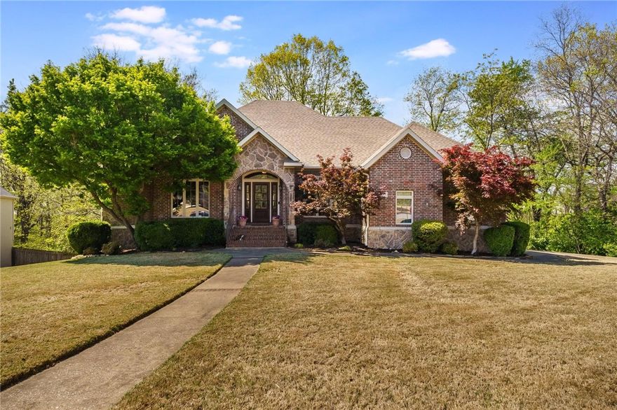 Absolutely gorgeous corner home tucked away in the back of Brookhaven Estates. A well maintained 4-bedroom, 3.5 bathroom home centrally located within walking distance to the Razorback Greenway, Mud Creek Trailhead, Butterfield Elementary as well as just a short hop onto I49. This home is a true gem with the primary suite, living area, office and kitchen well laid out on the main floor and the remaining three bedrooms located downstairs along with an oversized game room and extra storage. A private and serene multilevel back porch and patio is a family and entertainers' dream. Home warranty included with acceptable offer.