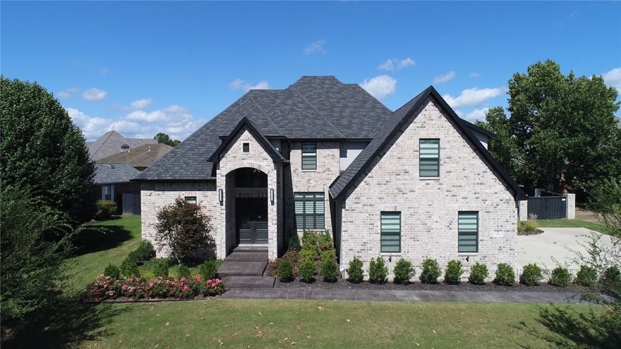 This masterpiece of design and craftsmanship is only three years old and is served by Bentonville Public Schools. It has been meticulously maintained and exudes five-star modern elegance. All 5 bedrooms boast sleek en-suite baths and generous closets. Perfect for entertaining with a gourmet kitchen open to the family room and outdoor living space. Enjoy golf, tennis, swimming, or dining within walking distance in this safe, friendly community in the heart of Northwest Arkansas.  THIS HOME IS MOVE IN READY!