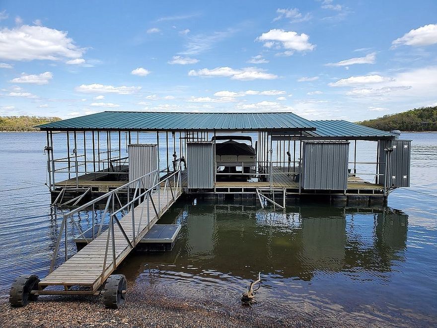 eaver Lake retreat!! Beautiful views from every window! Situated on a private drive. Spectacular lakefront home with private dock featuring 2 boat lifts with attached swim deck and a third lift for a couple jet skis or other small watercraft. Peaceful, but not far from town. If you like design, here's a great canvas for a creative mind.