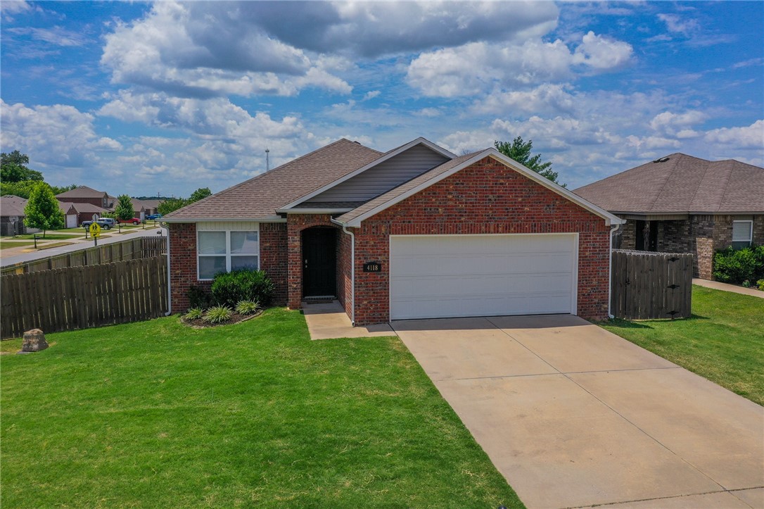 Welcome to your new home in West Springdale! This charming 1,436 square-foot residence features three bedrooms and two bathrooms, perfect for comfortable family living. Enjoy an open concept design, a well-appointed kitchen with ample pantry space, and a split floor plan for added privacy. The home boasts new carpet throughout, a two-car garage, and a covered patio overlooking a beautifully landscaped, fenced backyard. As part of a vibrant community, you'll have access to a sparkling pool. Located within walking distance to Shaw Elementary and Shaw Park, this home combines modern living with unbeatable convenience. Current school zoning would include Shaw Elementary, Hellstern Middle, Central Jr High, and Har-Ber High School.