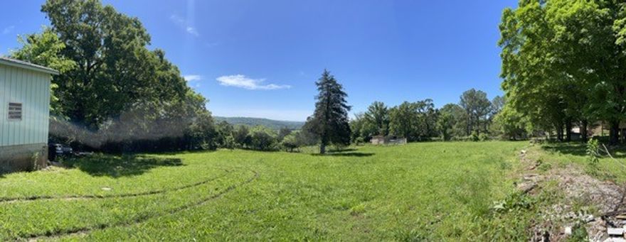 This charming 3 bedroom 1 bath home with a basement level has a newer A/C unit, new water heater, wood cabinetry, gazebo and new deck built on January 2025 sits on 2.53 acres. Back porch has beautiful views of War Eagle Valley. The front of property has some highway road frontage. This home also features a detached 1,110 sqft shop. Home is located right off HWY 412 Business and minutes away from Walmart and Huntsville Schools.
This home is about 1 hour from Branson and about half hour from Fayetteville and Eureka Springs.