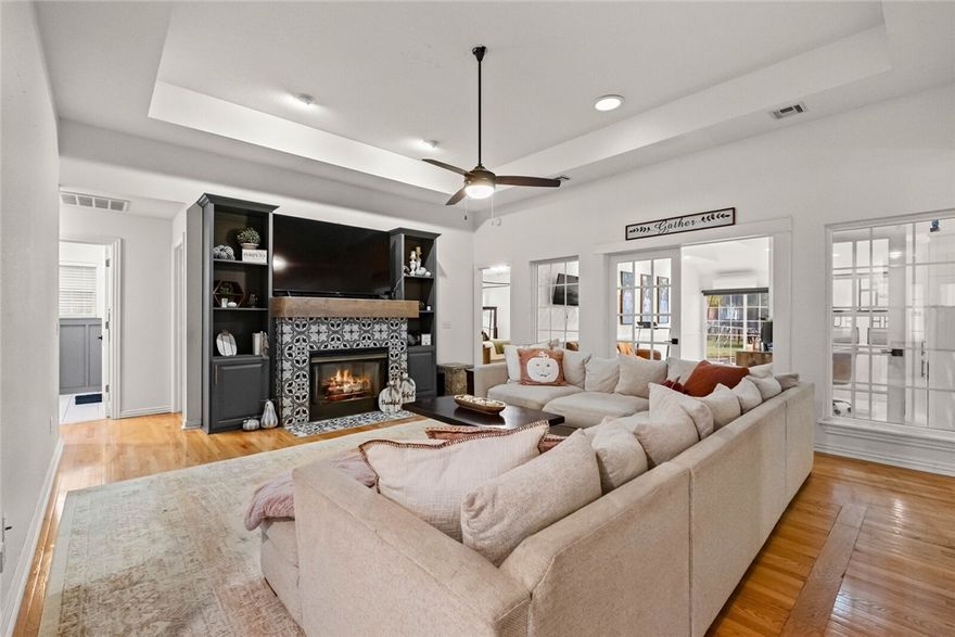 Are you ready to call Bentonville home? This home has it all! Location! Beauty! Move-in Ready! This beautifully updated Bentonville home is ready to be yours! Conveniently located near Coler Mountain Bike Preserve, Downtown Bentonville, the new Walmart Home Office, and top-rated schools. The spacious main living area flows seamlessly into a fully heated and cooled multi-purpose room - ideal as a playroom, home office, four-seasons space, or entertainment area. Updates galore! New tile accenting the original wood floors, fresh paint, modern hardware, stylish lighting, and a refreshed kitchen with updated appliances. Every closet includes custom built-ins, and the fireplace features a new mantel adding warmth and charm. The primary suite offers a luxurious, updated bath designed for peace and relaxation. With timeless finishes, flexible layout, and move-in-ready appeal, this home perfectly balances function and style!