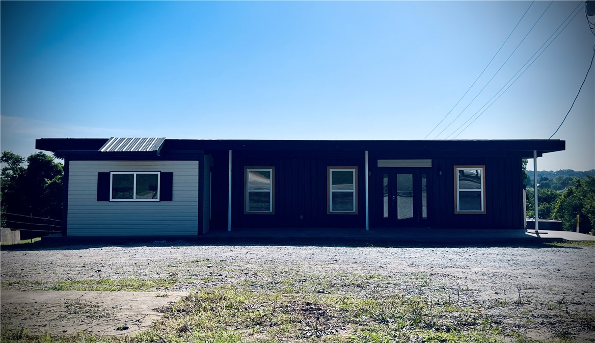 This 1350 sq ft building, previously used as commercial, is conveniently located in a dual use zone inside Huntsville City limits on a .25-acre corner lot. It has recently been renovated to 3 bedroom ,1.5 bath, with a laundry room, huge living room, kitchen and dining area with an unfinished full walk-in basement for lots of storage. The possibilities are endless. If you want to make this your first home or need a nice space for business this building has it all covered. Itās move in ready. Lender to verify but could qualify for FHA, VA or RD financing.