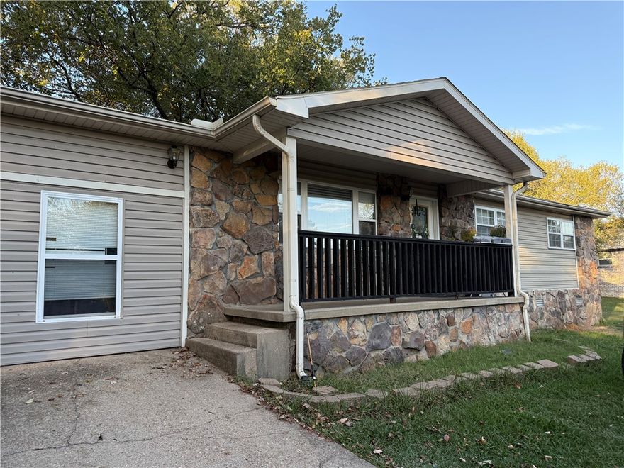 Beautiful home with 5 bedrooms and 2 bathrooms. Has large stone fireplace with gas logs, vaulted ceilings with exposed wood beams. Spacious bedrooms with two that were converted from garage. Plenty of space for a large family. Fenced backyard and 12x16 Storage building that stays with the property. Carport will also stay with the home.
