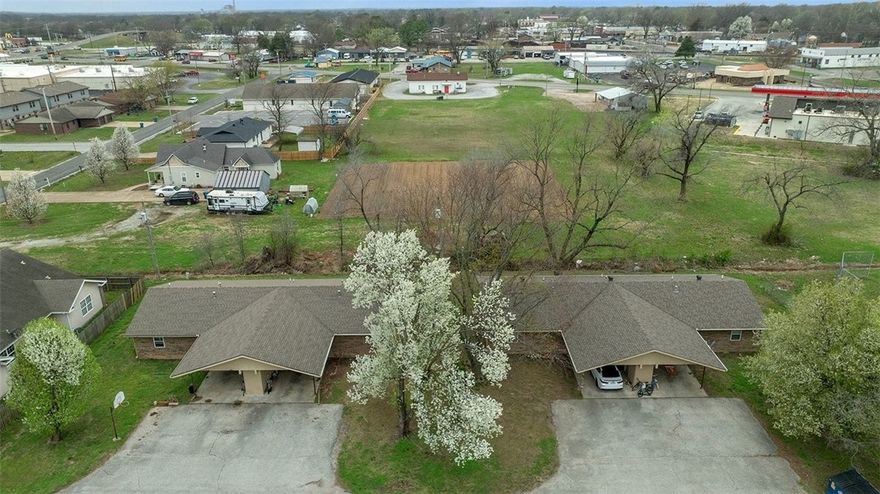 Great investment opportunity in these 2 brick duplexes, 4 units in total.  Each unit is 1152 square feet, has 3 bedrooms, 1 full bath plus a vanity with sink in the primary bedroom, attached carport, patio, storage shed for each unit, and lots of parking space.  Located on quiet culdesac in convenient location in Gentry, next to grassy park like area. Walking distance to grocery store, convenient stores, restaurants, and downtown Gentry. Easy access to both Rt 59 and Rt 12. Original owners have done a great job maintaining these buildings.