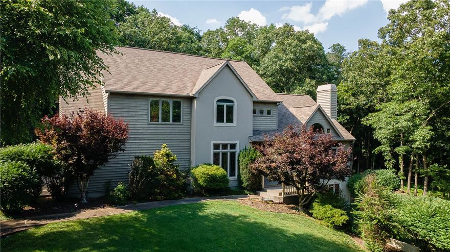 Don't miss this fabulous East Fayetteville home nestled in the secluded wooded Fox Run neighborhood. This custom home features 5 bedrooms & 3.5 baths. The main level will wow you with wood floors, picture windows to enjoy the surrounding nature, study, living room, dining room and remodeled gourmet kitchen. With newer Jenn-Aire appliances, quartz countertops, subway tile backsplash and huge island, entertaining guests is a breeze. Living room has high ceiling and vented gas fireplace. The 2nd level boasts the primary suite with expansive walk-in closet and remodeled bathroom w/ stand alone soaker tub and 3 large bedrooms w/ walk-in closets. The walkout basement is perfect for the teenager or guest quarter with slate floors, bedroom, full bath & separate living room. Cedar siding melts into the tree studded 3.27 acre lot. The Generac generator fires up w/ any power outage to keep you warm. Brand new TREX deck off the back. Large 3-car garage. Full irrigation. Walk the trail to the river for fishing or play. New HVAC