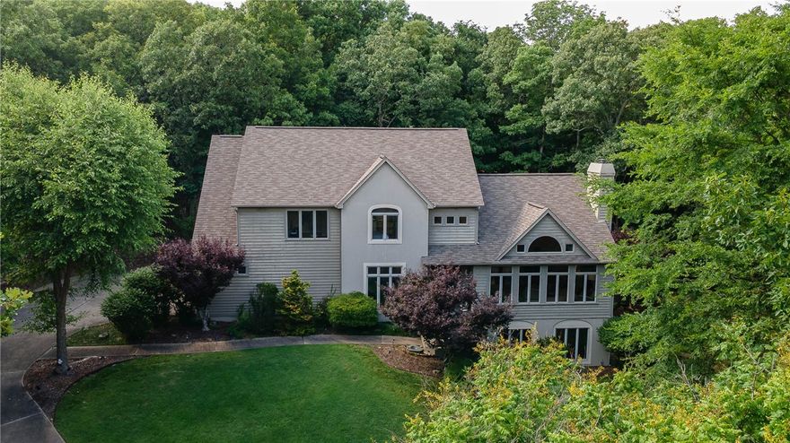 Distinctive private retreat crafted by a leading NWA custom builder on a quiet cut-de-sac in East Fayetteville & only 5 minutes from the commercial district. Picture windows offer natural light & spectacular views of greenery of the 3.27 acre secluded  lot, which is ideal for private nature & gardens. Quick access to free, private POA-owned White River access for camping, fishing & other sports is included in POA dues. Remodeled gourmet kitchen, new HVAC & large, low maintenance TREX deck, plus 3 car garage with ample storage, extensive guest parking a a natural gas powered Generac whole-house generator make this unique 5 bedroom, 3.5 bath home with high ceilings, large closets and a walkout basement perfect for family and guests. The 2nd level primary suite boasts an expansive walk-in closet, stunning remodeled bathroom with a stand alone shower, free standing soaker tub and beautiful view of the woods behind you. Other features include an office, electronic security system, gas fireplace and fully irrigated yard.