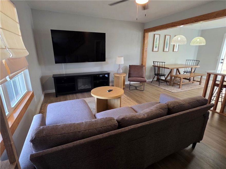 Recently updated luxury townhome ideally located on Moberly Ln between SE 8th St and SE 5th St, only 4 blocks from the new Walmart Home Office, 5 min to Downtown Bentonville Square, and quick access to I-49. This modern residence is furnished and features stylish finishes, open-concept design, and included appliances — washer, dryer, and refrigerator — making turnkey move-in effortless. Enjoy the convenience of low-maintenance living plus access to an on-site multi-purpose sports court for recreation and community connection. Location, lifestyle, and luxury — all in one exceptional opportunity.