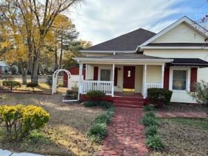 Home has been completely updated and remodeled. New appliances including washer, dryer and refrigerator. Windows, roof, water heater, HVAC all newer and replaced within last 3 years per previous owner. 2 outbuildings and the whole yard is chain link fenced.