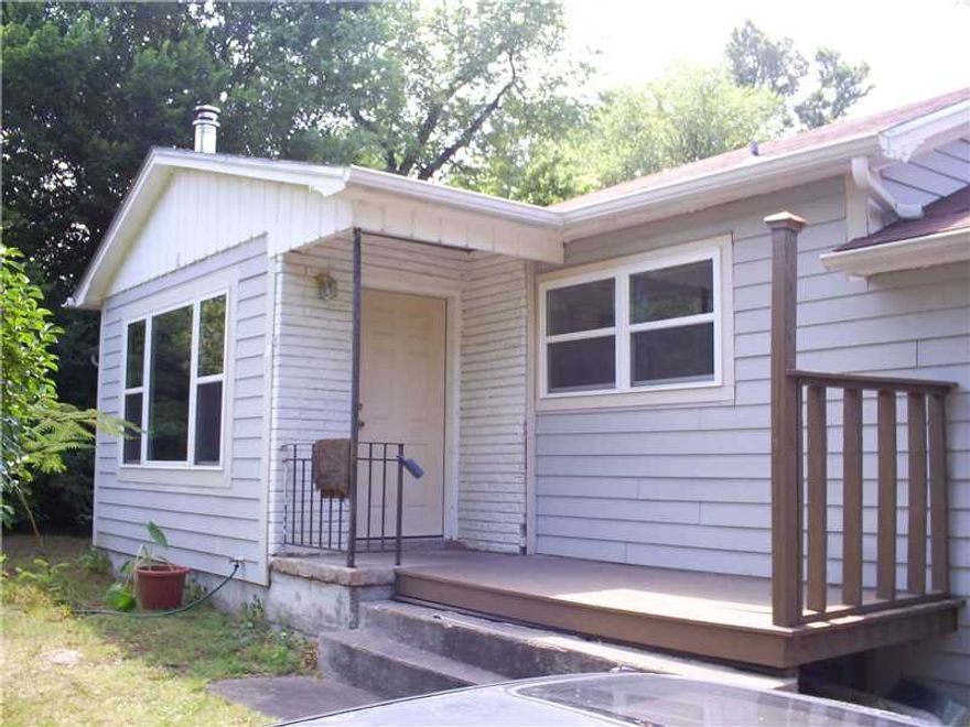 CHARMING 3BR/2BA HOME CLOSE TO MT. SEQUOYAH & HISTORIC DISTRICT OF FAYETTEVILLE. BRAND NEW HEAT/AIR SYSTEM. GARAGE HAS BEEN CONVERTED INTO A POTENTIAL EXTRA LIVING AREA W/UTILITY ROOM & 2ND BATHROOM. RECENT ROOF REPLACEMENT,& NEW WINDOWS, BUT STILL HAS AREAS THAT NEED A LITTLE ATTENTION. GREAT BACKYARD, LOTS OF PRIVACY AND WONDERFUL LOCATION.  CHECK IT OUT!!