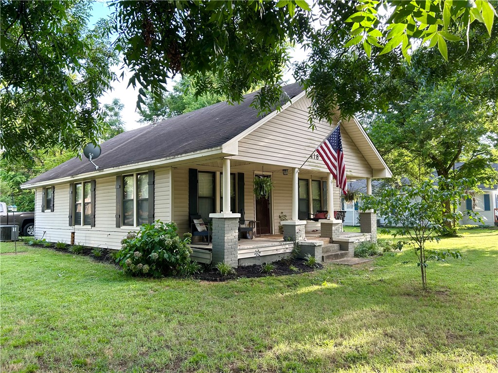 This charming 3 bedroom home sits on a corner lot big enough to subdivide in a wonderful location just about a mile from Arkansas Tech University. Recently updated with all new plumbing, electrical, flooring, paint and finish, this house is move-in ready. The spacious front porch gives a wonderful place to relax on those breezy summer evenings. Don't miss your chance, schedule your showing today!