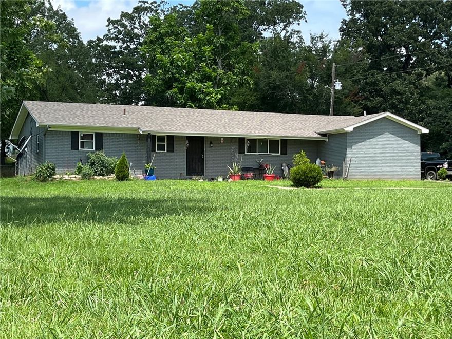 Looking for space, peace, and a place that has it all? This 4-bed, 2-bath brick home sits on 7.6+/- acres in Lavaca and has a new roof and HVAC, a 40x40 workshop, storm shelter, and even a pond! With 2,025 sq ft of living space, there's plenty of room to spread out — inside and out. Whether you want to tinker in the shop, enjoy some quiet country sunsets, or just have extra room to breathe, this place has you covered. Just minutes from town but feels like your own private getaway!