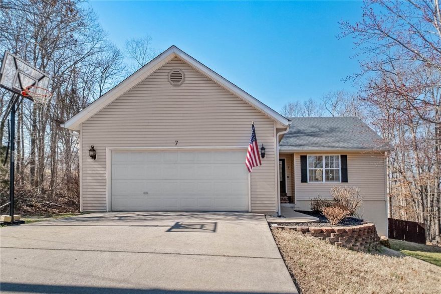 Trail-side living meets meticulous care in this beautifully maintained Bella Vista home. Ideally located within biking and walking distance to Tunnel Vision, Tweety Bird, Down Under, and the new bike lift, this property offers the perfect blend of comfort and adventure. The open concept main level is bright and welcoming, while the fully finished basement adds incredible flexibility with two bedrooms, a full bathroom, and bonus space for a second living area, office, or recreation. Thoughtful updates include a new roof (2020), water heater (2024), deck (2023), and recently replaced kitchen sink. The large backyard offers plenty of room to unwind or entertain. Move-in ready and designed to enjoy the very best of Bella Vista living.