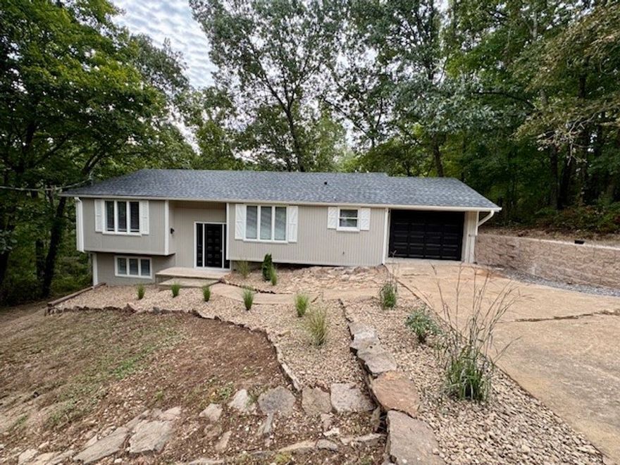 Lots of updates with this Single Family home located close to Bella Vista Lakes and backs up to the Up Hill Both Ways Biking Trail!. This home features a new roof, new hot water heater, fresh interior & exterior paint, new wood flooring, new stainless steel appliances, fireplace, open floor plan, 2nd living area or den downstairs, 1 car garage, extra parking and more.  Also listed for Rent MLS# 1320017