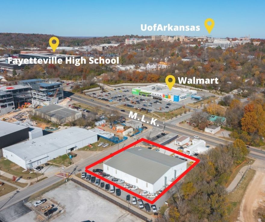 Excellent location for an investor or business looking for space to grow. This warehouse is an extremely rare find that is close to I-49 and the Fayetteville business district. You can walk out the back door and be on the greenway and head north or south. New construction projects ranging from apartments to commercial space surround the building on all sides.