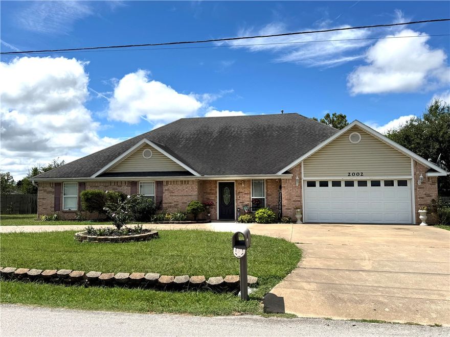 Beautiful  and spacious 4 bedroom 2 bath home  featuring a finish bonus room and half bath in the attic ideal for on office or studio. This well maintained property sits on a large lot 0.70- acre lot with plenty of outdoor space for entertaining or expansion. enjoy 2 car garage comfortable layout, and a quiet location close to shopping, schools, and parks in Rogers A great combination of space ,function and privacy