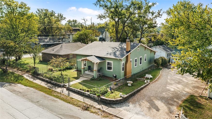 LOOKING FOR AN AIRBNB OPPORTUNITY OR A BEAUTIFUL HOME IN DOWNTOWN SILOAM SPRINGS * NEW ROOF! FACELIFT FRESH PAINT. Walking distance to shopping, schools, churches, restaurants, John Brown University, pickle ball courts & walking trails. This is an original structure with lots of character. EXTREMELY well maintained and LOVED! 3 bedrooms/2 bathrooms, additional living space/area, fireplace, dining room. Unfinished, cemented basement under kitchen and lots of storage. VERY CLEAN! The rooms are spacious! The tall ceilings add additional character! Outside there is a fenced-in yard, small fire pit, strawberry patch, detached building *337 SF mol* which could be used as a workshop and/or storage. Carport from alley access in back of home! Come see for yourself! Sellers have lots of information on the house - ask all the questions! By appointment only!