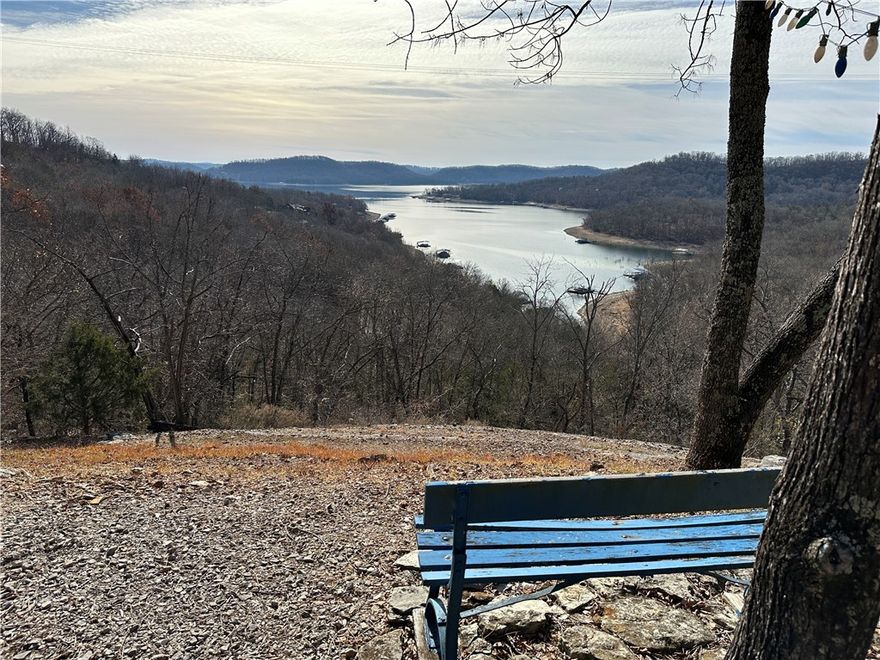 Discover a rare gem on Beaver Lake! 36-acres on Arrowhead Point Conservation Area, comprised of 4 unrestricted parcels, offers 992 feet of pristine shoreline bordering U.S. Army Corps land. Enjoy unparalleled privacy and stunning views.

Private Dock: A modern 2-slip galvanized dock (10x26 slips) with swim deck and locker.
Scenic Vistas: Multiple overlooks reveal stunning lake and landscape panoramas.
Exploration: Over 2 miles of trails, unique rock formations, and seasonal waterfalls await.
Amenities: A 24x30 insulated shop/garage (2017) and 10x20 storage building.
Utilities: Gateway Public Water access throughout.
Recreation: Private shooting range & proximity to Beaver Dam/Indian Creek Park.
Opportunity:
Ideal for a private retreat, commercial venture, or future development. The explosive growth in the area makes this a prime investment. Don't miss this chance to own a piece of Beaver Lake's beauty!