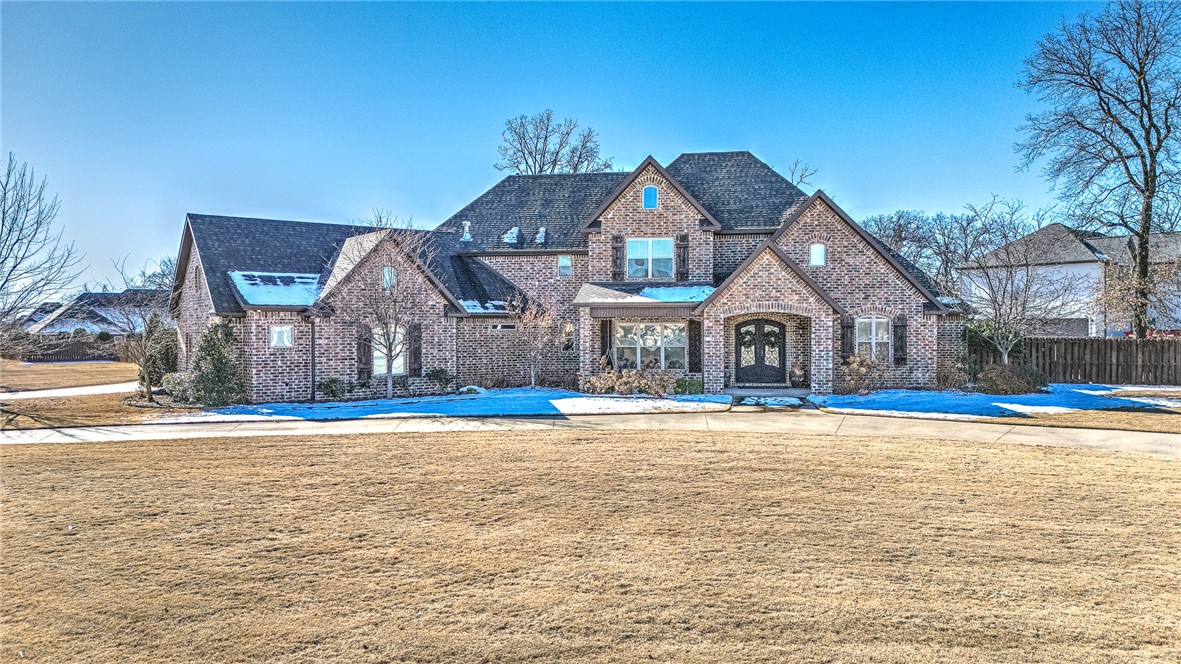 CUSTOM BUILT SHOWSTOPPER WITH BACKYARD PARADISE NESTLED IN ONE OF NORTHWEST ARKANSASā MOST DESIRED COMMUNITIES, RIDGEWOOD SUBDIVISION! Gorgeous 1.14 acre corner lot setting with spacious front circle drive to accommodate all your guests. Youāll fall in love with all the fabulous amenities offered in this exceptional 4 bedroom/5.5 bath home starting with the dreamy backyard setting boasting a private in-ground saltwater pool, hot tub, fire pit, 1,000 sq ft chipping green, & poolside pavilion w/ wood burning fireplace, outdoor fridge & gas grill! Inside you will find an open gourmet kitchen w/ large island & a walk-in pantry/storm shelter, dedicated study/office, sunroom, large living w/ fireplace & built-ins, main level private master retreat, 2 main level guest suites, bonus room, pool bath & mudroom. Second level hosts a huge bonus room leading to a sprawling covered patio overlooking the pool, theater room, guest suite, powder bath & tons of attic storage! 5 min to Mt Hebron Park & 10 min to Pinnacle Hills area!