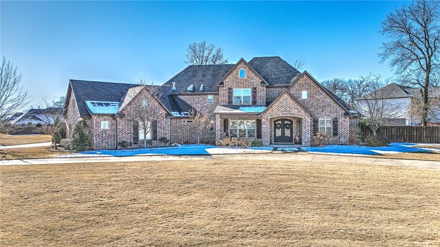 CUSTOM BUILT SHOWSTOPPER WITH BACKYARD PARADISE NESTLED IN ONE OF NORTHWEST ARKANSAS’ MOST DESIRED COMMUNITIES, RIDGEWOOD SUBDIVISION! Gorgeous 1.14 acre corner lot setting with spacious front circle drive to accommodate all your guests. You’ll fall in love with all the fabulous amenities offered in this exceptional 4 bedroom/5.5 bath home starting with the dreamy backyard setting boasting a private in-ground saltwater pool, hot tub, fire pit, 1,000 sq ft chipping green, & poolside pavilion w/ wood burning fireplace, outdoor fridge & gas grill! Inside you will find an open gourmet kitchen w/ large island & a walk-in pantry/storm shelter, dedicated study/office, sunroom, large living w/ fireplace & built-ins, main level private master retreat, 2 main level guest suites, bonus room, pool bath & mudroom. Second level hosts a huge bonus room leading to a sprawling covered patio overlooking the pool, theater room, guest suite, powder bath & tons of attic storage! 5 min to Mt Hebron Park & 10 min to Pinnacle Hills area!