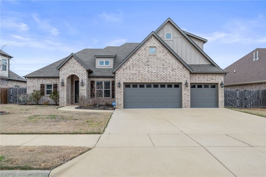 Prime location near I-49, top schools, parks, trails, a tennis/fitness club, and a Farmer’s Market! Nestled off S. Bellview Rd. in west Lowell, just north of the 100-acre Kathleen Johnson Memorial Park & Greenway Trail. The main level offers open living, an office, a primary suite, and an extra bed/bath. Upstairs features a bonus room, 2 more beds, and a bath with dual sinks. Highlights include a 3-car garage with epoxy floors, vaulted ceiling, gas fireplace, engineered hardwood, pantry, vented gas cooktop, stainless farm sink & built-in oven. The primary suite boasts coffered ceilings, a tiled shower, whirlpool tub & a large closet. Enjoy a covered patio, walk-out firepit, and direct access to the park, Greenway Trail & Matrix Fitness Club!