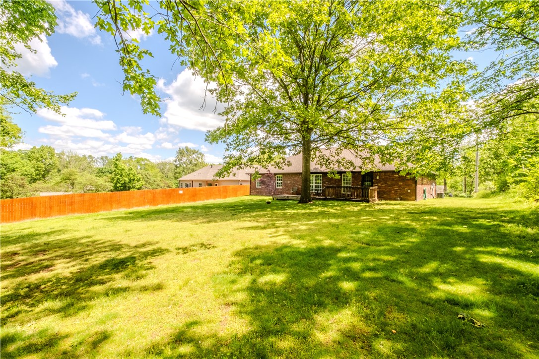 Tremendous Value!!! All Brick! One level,nice floorplan=large living,open floor plan w/vaulted & coffured ceilings,crown molding,Cozy gas fireplace 3-bed,2-bath,2 car garage w/1,733 sq.ft.Landscaped home,quiet cul de sac street w/flat backyard w/wooded view=wildlife, squirrels, deer, birds & more!Spacious primary suite features walk-in closet & en-suite bath w/ Whirlpool tub & shower.Kitchen solid wood cabinetry,lots of counter space to prepare your meals & breakfast nook.Relax on your deck overlooking level backyard and woods.Only Minutes to Loch Lomond’s boat ramps,scenic trails & golf courses,w/easy access Interstate 49.Bella Vista offers clubhouses,several recreation areas,including indoor & outdoor swimming,Mountain Biking paradise,walking trails w/creeks,concrete walking trail Branchwood center, playgrounds,covered areas w/grills to reserve for events.Golf Courses,7 Lakes,Loch Lomond Marina w/rental area for pontoon boats,Lake Avalon has swimming beach.Activities,dining &more.Seller consider selling furnished
