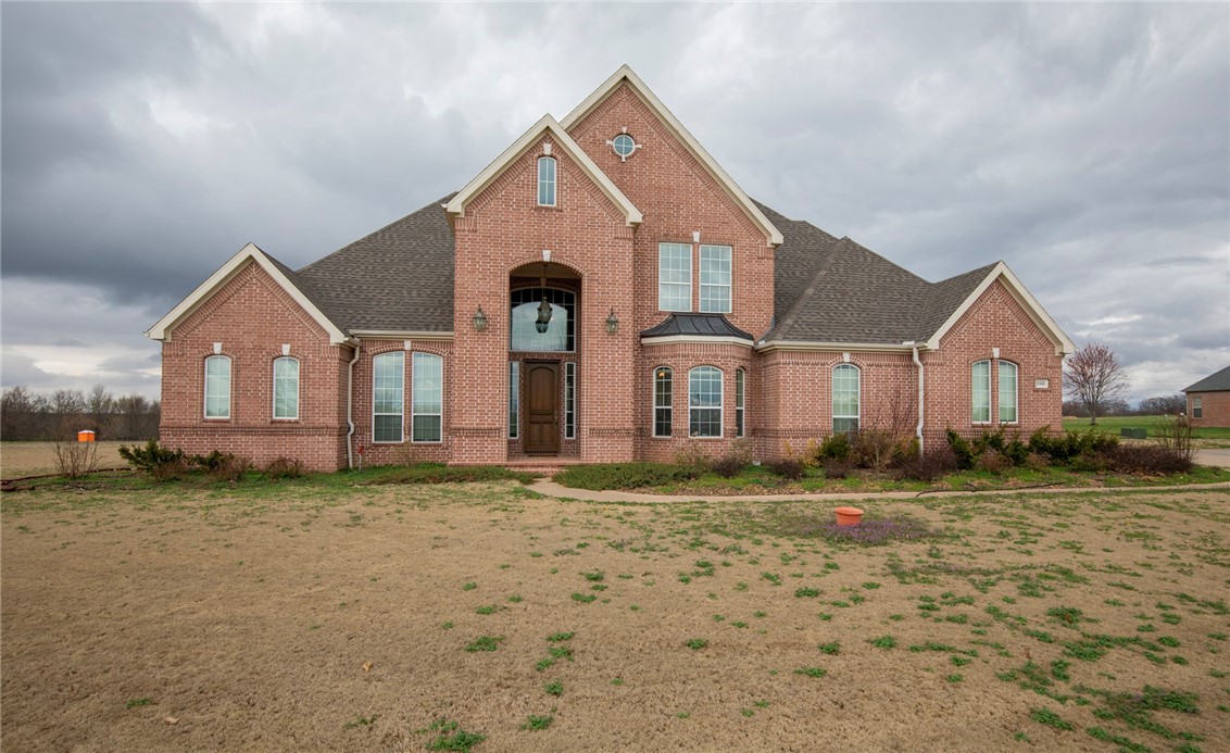 Custom brick home on 2.51 acres, beautiful pastural views, quiet country surroundings, NEW ROOF, gutters, plumbed for generator & outdoor grill. Riding mower negotiable. SHOP w/ 2 overhead doors, compressor, and work bench. Shop is 30 x 50, room for motor home, tractor, mower, etc.
That's just the outside.
Inside: hardwood floors, granite counters, island w/ salad sink, pot filler, double ovens, breakfast bar & casual dining area, pantry, 2 separate offices, coffered ceiling & wainscoting in office, bonus room upstairs, handicap accessible primary bath, 50 gal water heater, wood burning fireplace insert that will heat downstairs, 5 person tornado room, central vac, security system and more.......