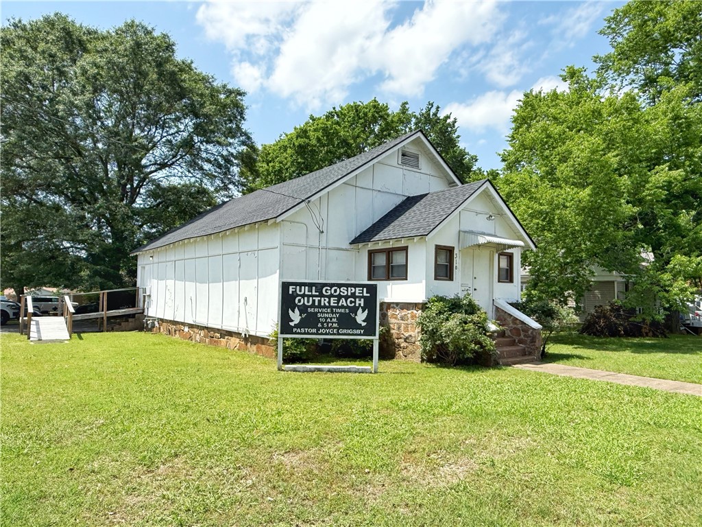 Discover the unique opportunity to own a piece of history with this quaint church, perfectly located just moments away from downtown. This property isn’t just a church; it’s an ideal event center, a wedding venue, or a retreat for community gatherings. The possibilities are truly endless! Priced under six figures, this property is a rare find in today’s market. Don’t miss your chance to explore this extraordinary property time is of the essence!