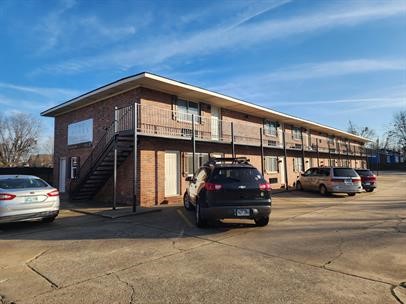UNDER NEW MANAGEMENT! Very nice 1 bedroom, 1 bath downstairs apt with trash service AND water. Refrigerator and stove included. Coin laundry service on site. No smoking. Pets will be considered with pet fee. $300 for first pet, $200 for a 2nd, maximum two allowed. $900 security deposit- payable in 2 installments. $350 due at signing. An application is required for each adult. The processing includes background checks, credit check, proof of employment/income, rental history and references. Please call 479-754-4663 to request a showing.