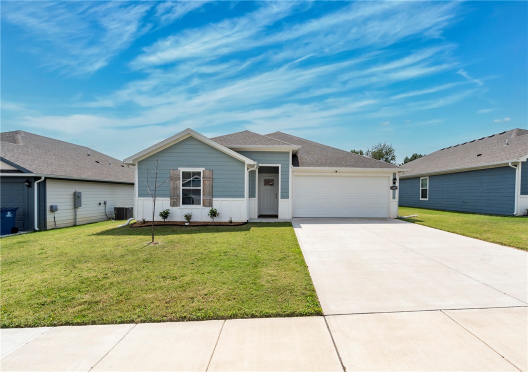 Why wait to build when this 2023 Main Street Village home has it all? This 4BD, 2BA, 1698SF home offers a split open floorplan. The eat in kitchen features quartz countertops,SS appliances,large island,walk in pantry,plus the refrigerator/washer/dryer all convey,making it truly move-in ready. Throughout the home,you’ll find durable LVP flooring,while the spacious primary suite has dual vanities,walk in shower & large walk-in closet for plenty of storage. The three additional bedrooms, you’ll have plenty of room for guests,a dedicated office or creative space. Programmable Wi-Fi thermostat, ADT security w/ touchscreen panel & cameras on front/rear. Step outside to enjoy the covered back porch overlooking the privacy-fenced backyard, perfect for relaxing or entertaining outdoors. Home is minutes away schools, shopping, dining, parks & downtown. Ideally located for easy access to Hwy 12 & 59 making commuting a breeze to Siloam or Bentonville, also located less than 20 minutes from Northwest Arkansas National Airport.