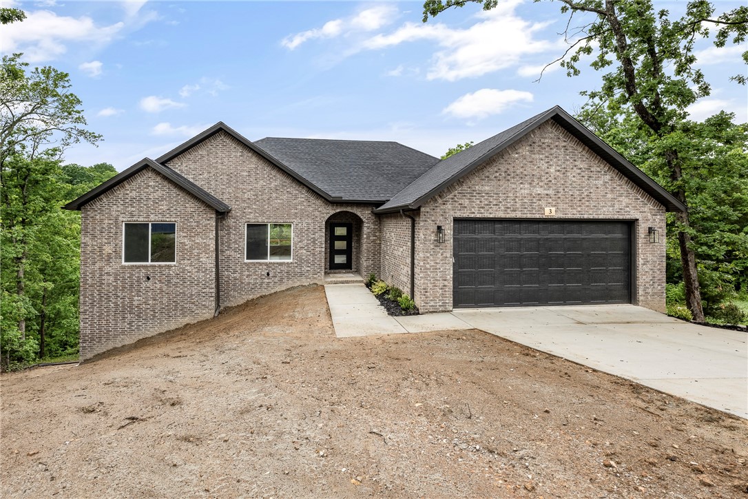 Don't miss out on this beautiful new construction by Elite Thomas Homes. This popular 3 bedroom, 2 bath, 2 car garage home is located on the East side of Bella with trail access near by. Great home for entertaining. Vaulted ceiling and beams in the main area and gas fireplace with stack stone in living room. The kitchen has a large island, granite countertops, white brick subway tile backsplash and stainless steel appliances. Also enjoy the the large covered deck with an extended uncovered section. The spacious primary suite has a large walk in closet with door to the laundry room. Primary bath has a dual vanity, larger tile shower with two shower heads, linen closet, and separate toilet room. The other side of this split floor plan has bedroom 2 and 3 with a nice hall bathroom.
