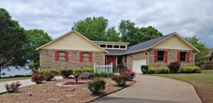 LAKEFRONT HOME...Come see this beautiful 3 bedroom home located in Western Russellville on Marina Road. The living room, with tall ceilings and gas fireplace, as well as the master bedroom are designed to take in the stunning view of the lake. This home features beautiful hardwood and ceramic tile flooring, granite counters, large kitchen with island, and a master bath second to none! The heated/cooled basement area is perfect for adding a workout gym, game room, or hobby room, approximately 400 sq ft (footage not counted in overall heated & cooled footage). Property is walking distance to Lake Dardanelle State Park & Marina. The shaded back yard & covered deck is a great place to have your morning coffee or simply unwind at the end of the day & enjoy the lake view. Come see for yourself!