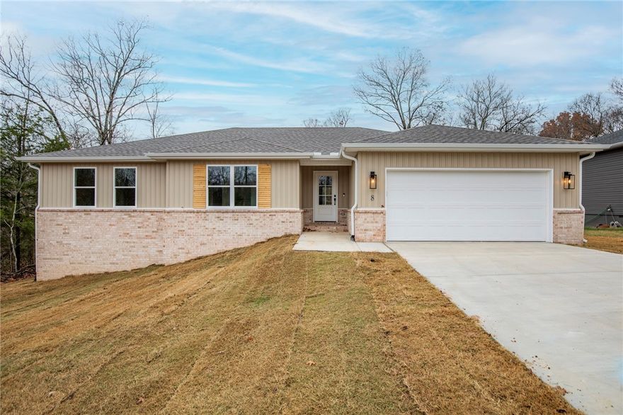 Gorgeous New Construction in Bella Vista that is Move in Ready!!!!!!
There is an abundance natural light pouring into the
living room, fireplace framed by built in's and floating shelves. Open concept and kitchen that is perfect for
entertaining with a large walk in panty. Master bathroom with custom tile shower and free standing tub.
The bathroom leads into the large master closet......which leads to the laundry room for easy access to
hang up your clothes straight from the dryer. Beautiful modern light fixtures, plumbing fixtures, and
hardware. Custom cabinetry & woodwork with Quartz countertops. Smart Thermostat for Energy
Efficiency. The exterior has a Ring Doorbell, custom cedar shutters, covered deck, & attached 2 Car garage. Close proximity to the Rec Center, Interstate Bike/Hiking Trails, ,Golf Courses, and Lakes!!