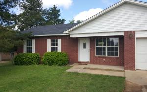 New, new, new! New paint, new hand scraped flooring,new tile, new ceiling fans, new stainless steel appliances. 3 bed plus bonus room,2 full bath. Fenced backyard, deck, storage building. Roof and hot water heater only 2 years old. A/C Unit only 3 years old. Realtor owned.